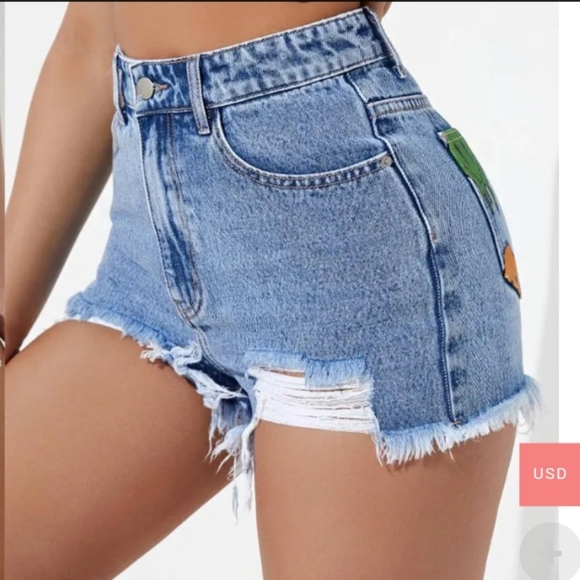 CARTOON FACE PRINT RIPPED RAW CUT DENIM SHORTS. WOMENS SIZE S. BNWT. - Picture 2 of 4